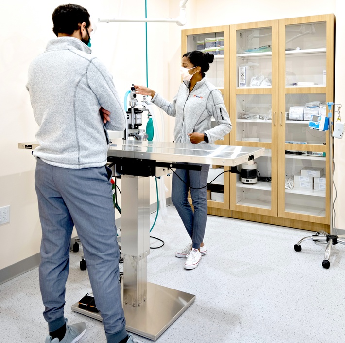 Two doctors in a surgery room.